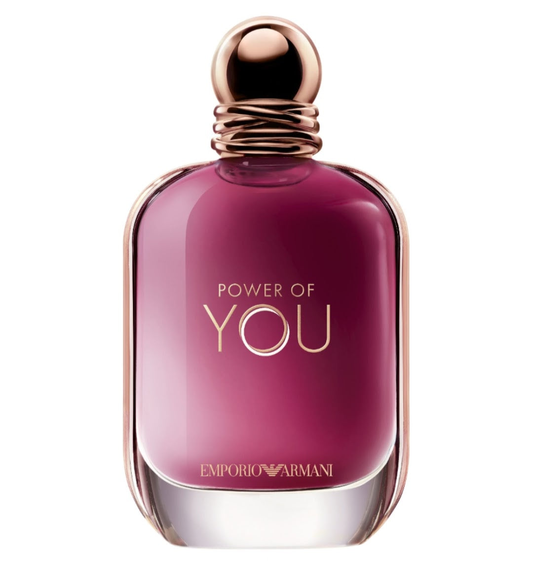 Emporio Armani Power of You Eau de Toilette bottle, featuring a deep magenta-pink glass body with rose gold metallic lettering and a matching metallic cap, set against a plain white background.