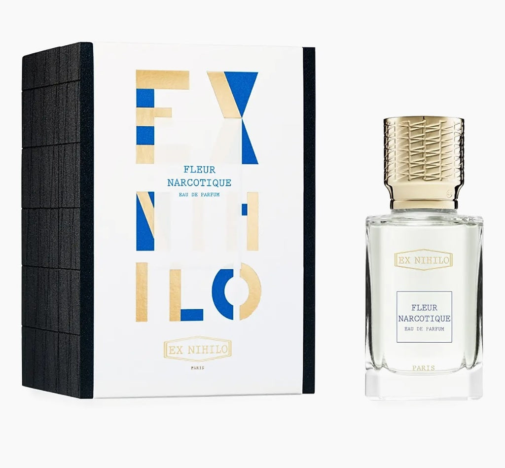 EX NIHILO Fleur Narcotique Eau de Parfum shown with its white and black box packaging and the clear glass perfume bottle with a textured gold cap on a light gray background.