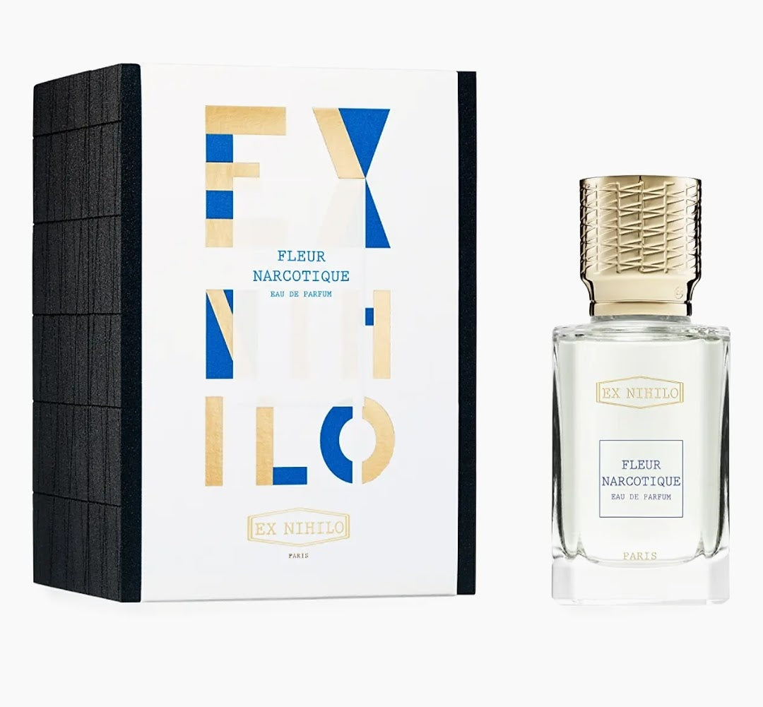 EX NIHILO Fleur Narcotique Eau de Parfum shown with its white and black box packaging and the clear glass perfume bottle with a textured gold cap on a light gray background.